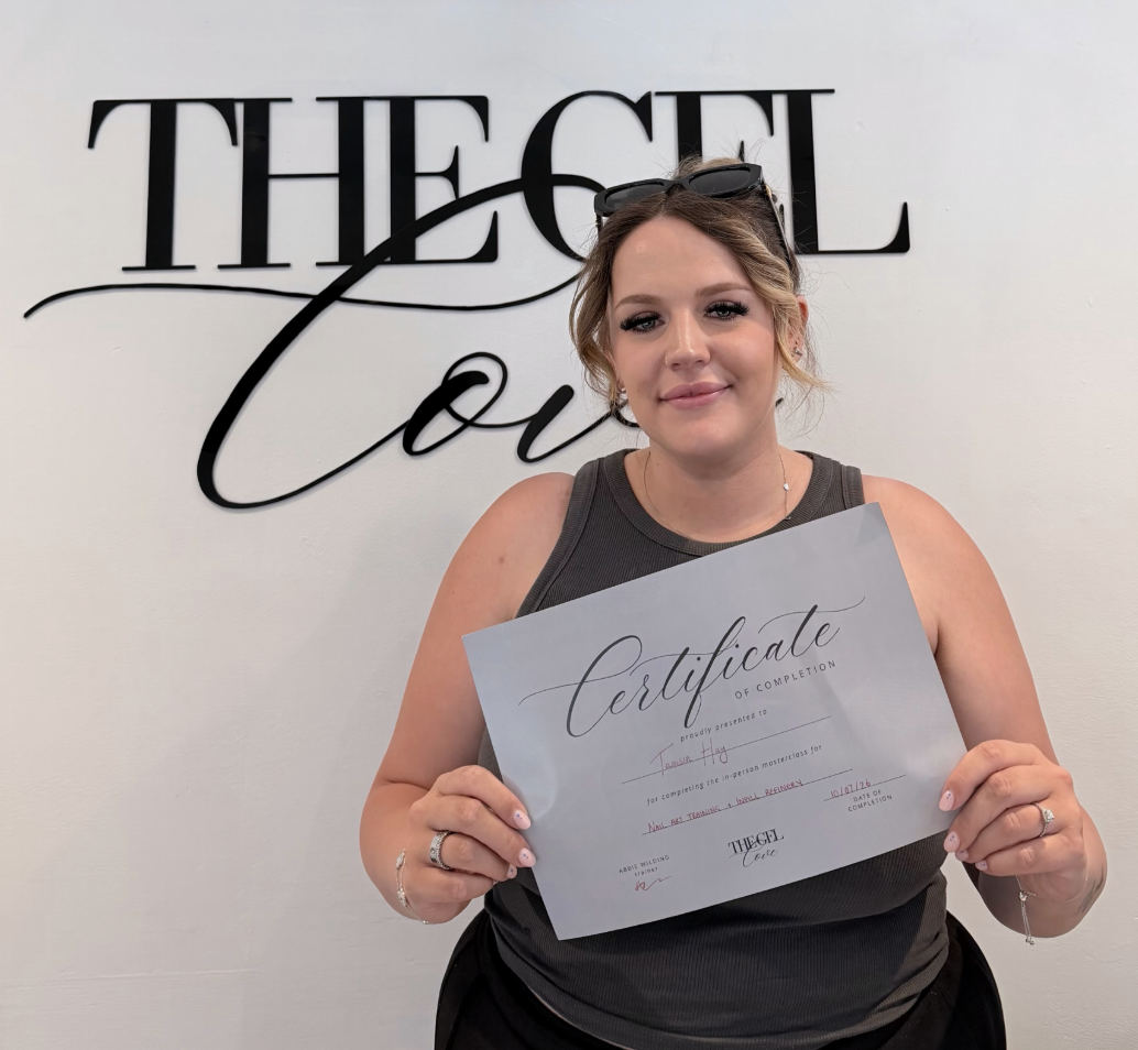 Student with certificate after training